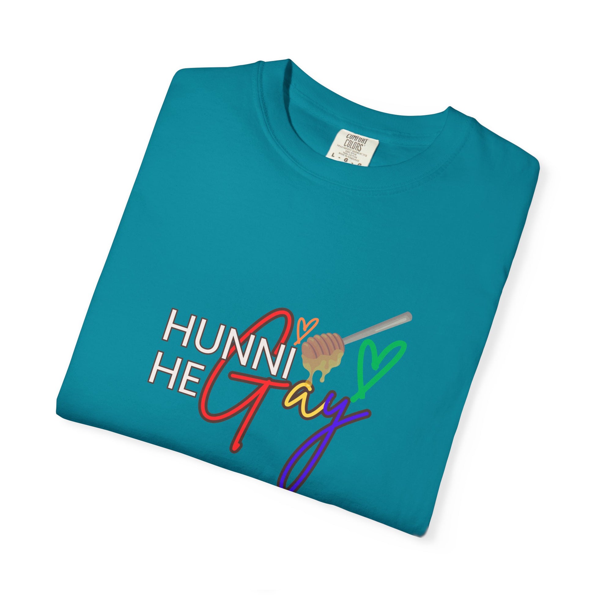 Bright teal Pride t-shirt with “Hunni He Gay” printed across the chest—bold, expressive, and effortlessly stylish