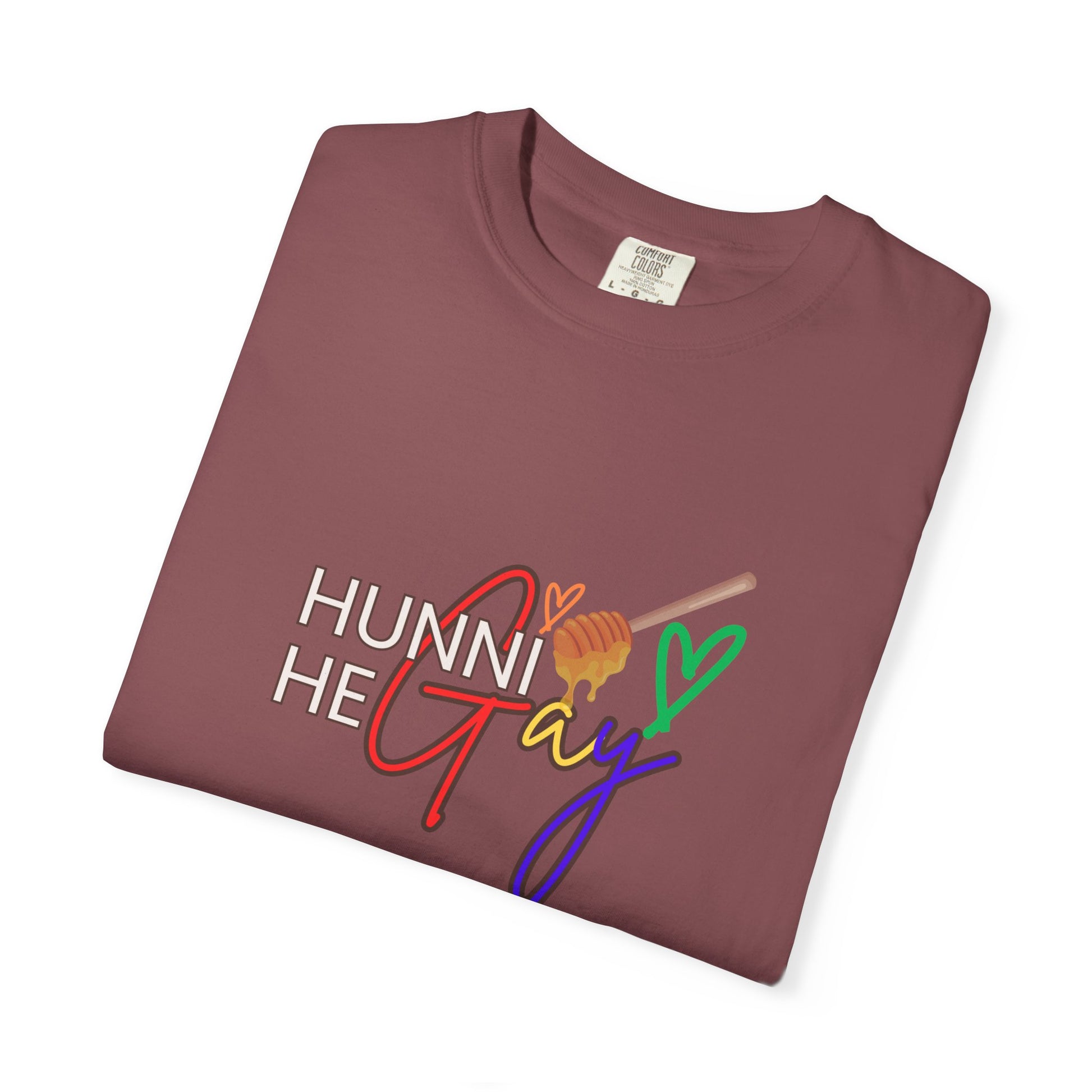 Rich plum-colored Pride t-shirt with “Hunni He Gay” printed across the chest—blending boldness with self-expression.
