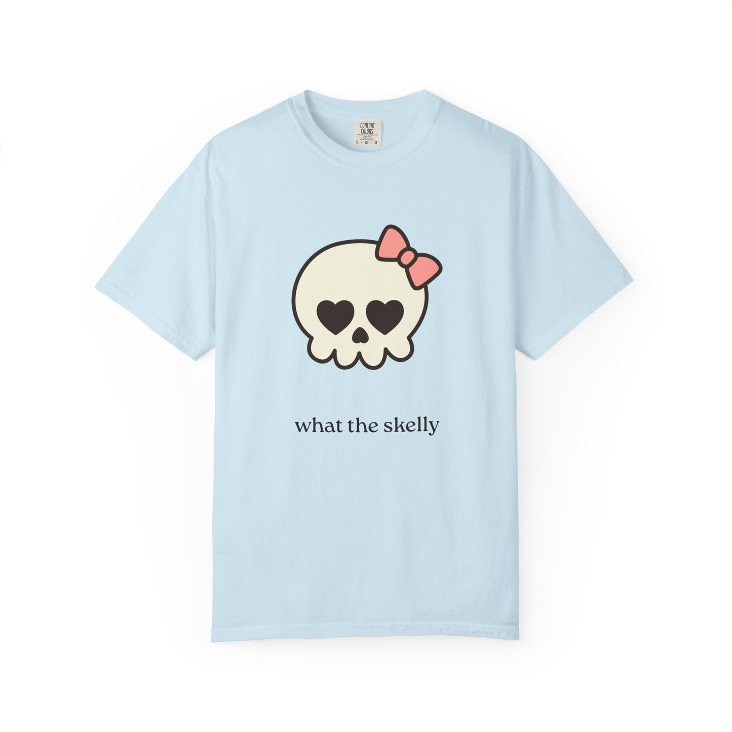 Light blue Halloween tee with wide-eyed skeleton and “What the Skelly?” text, perfect for playful October outfits.