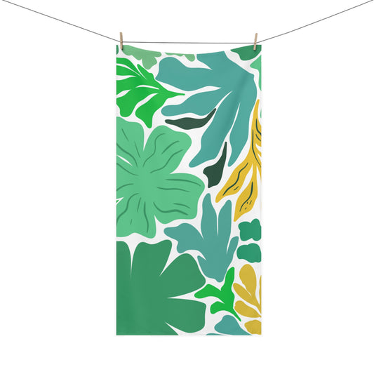 Bathroom towel with vibrant green and yellow floral pattern – maximalist retro decor for spirited homes