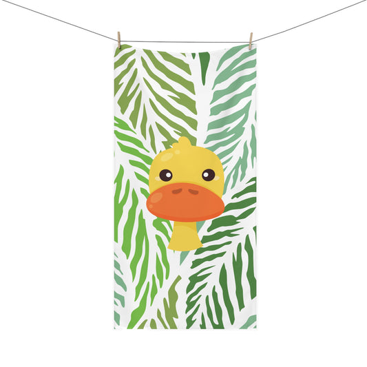 Bathroom towel featuring expressive duck in bold jungle scene with green and gold palette – maximalist tropical decor for playful homes
