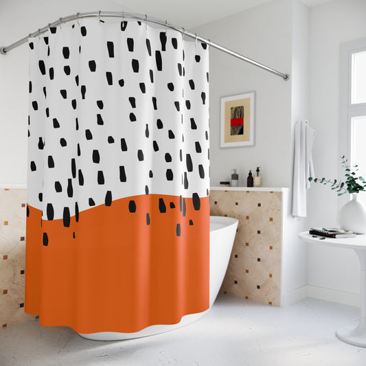 Front view of orange and black Mid-Century Modern shower curtain hanging in a white-tiled bathroom