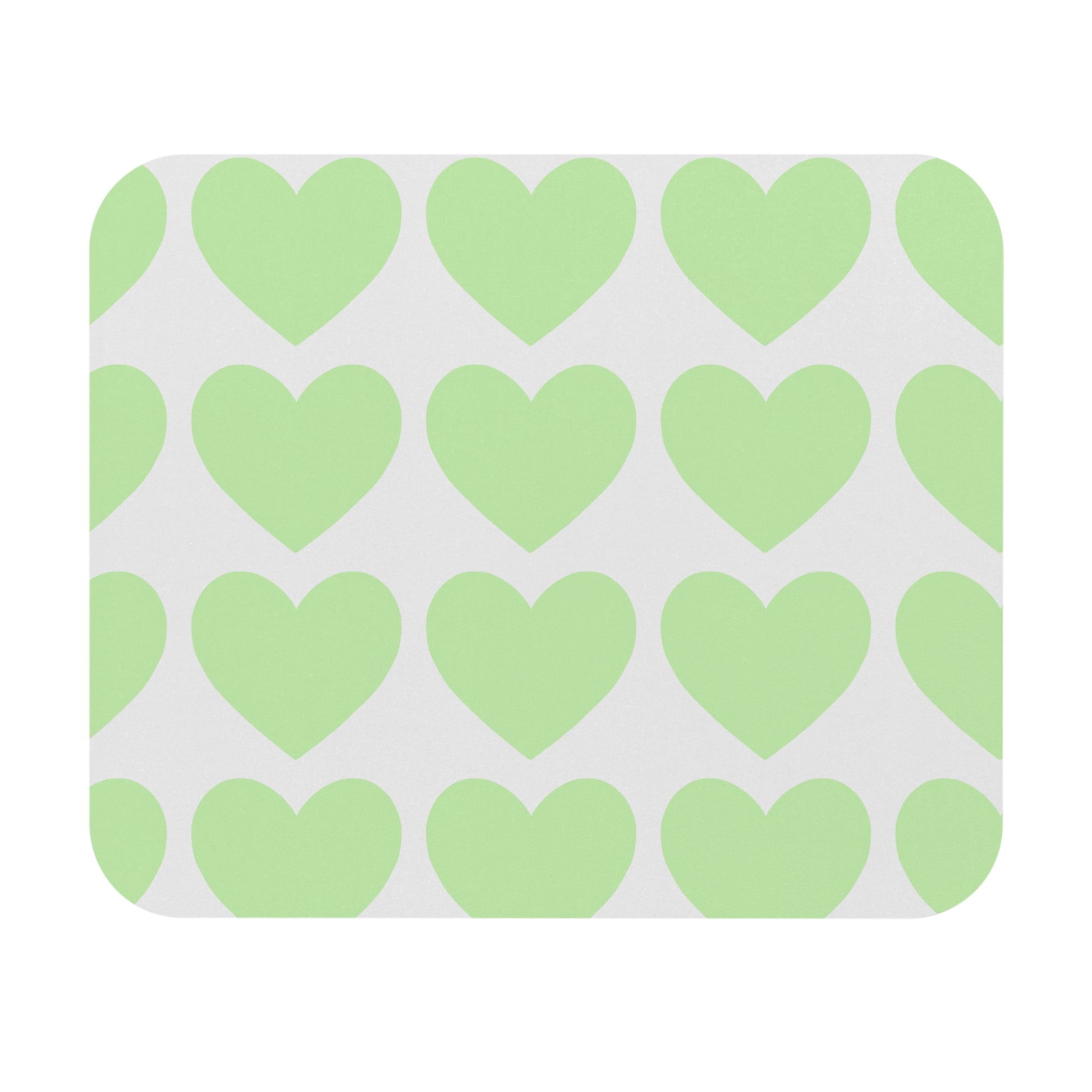 Large mouse pad with mint green heart pattern styled on cozy college desk