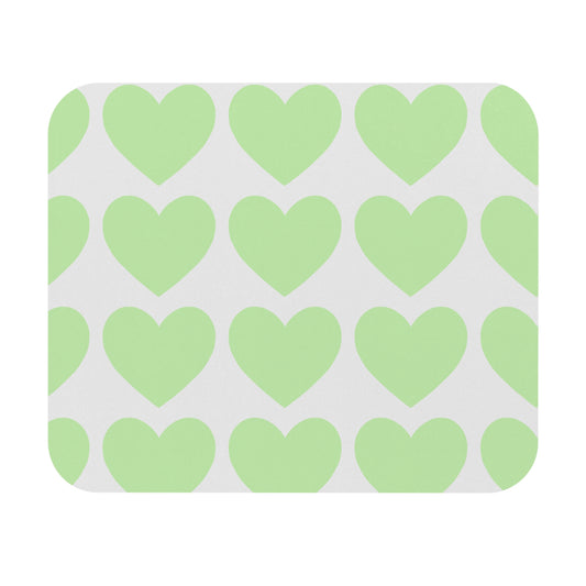 Large mouse pad with mint green heart pattern styled on cozy college desk