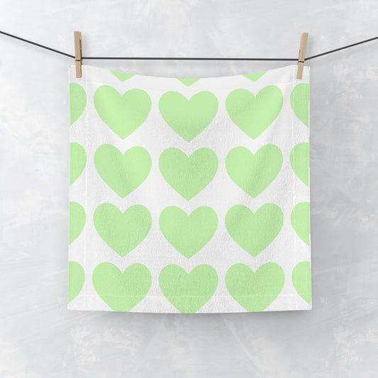 Mint face towel with heart accents, perfect for college dorm bathroom style