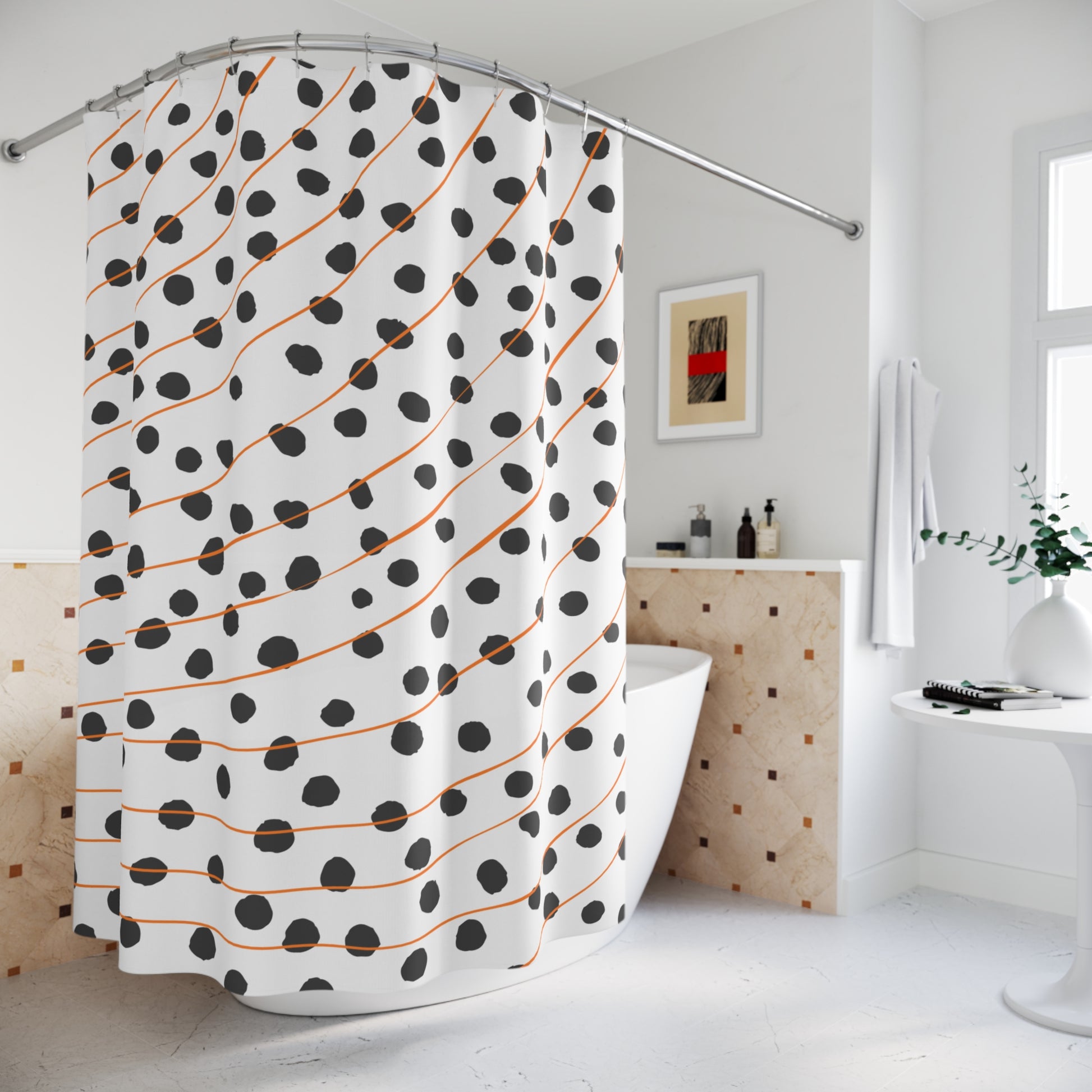 Styled bathroom scene with modern orange polka dot and striped shower curtain