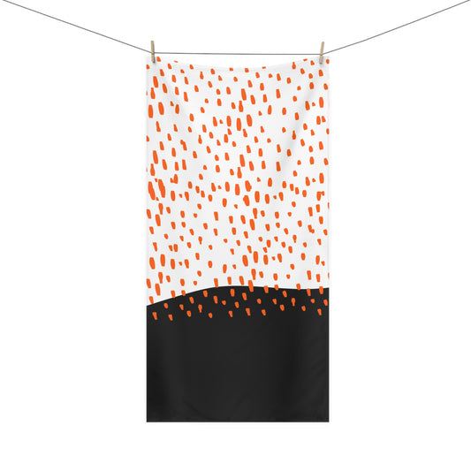 Front view of black and orange midcentury rain bath towel