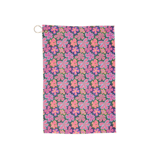 A bright, high-contrast floral golf towel featuring bold neon-colored blooms. A striking, retro-futuristic design perfect for players who love statement accessories
