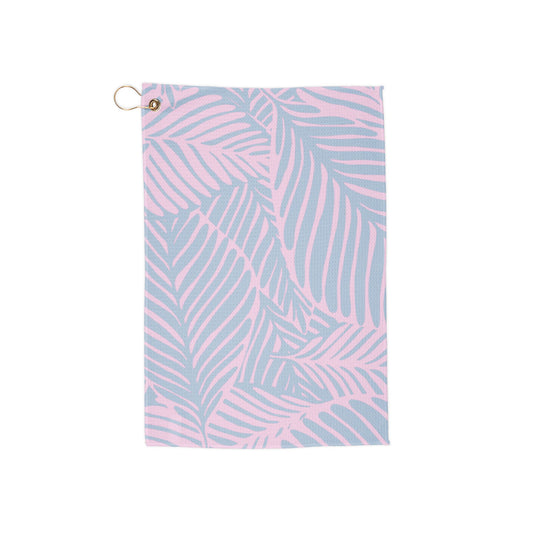 A soft yet exotic golf towel featuring delicate pastel hues with jungle foliage. Dreamy, lush, and effortlessly stylish for tropical-loving players