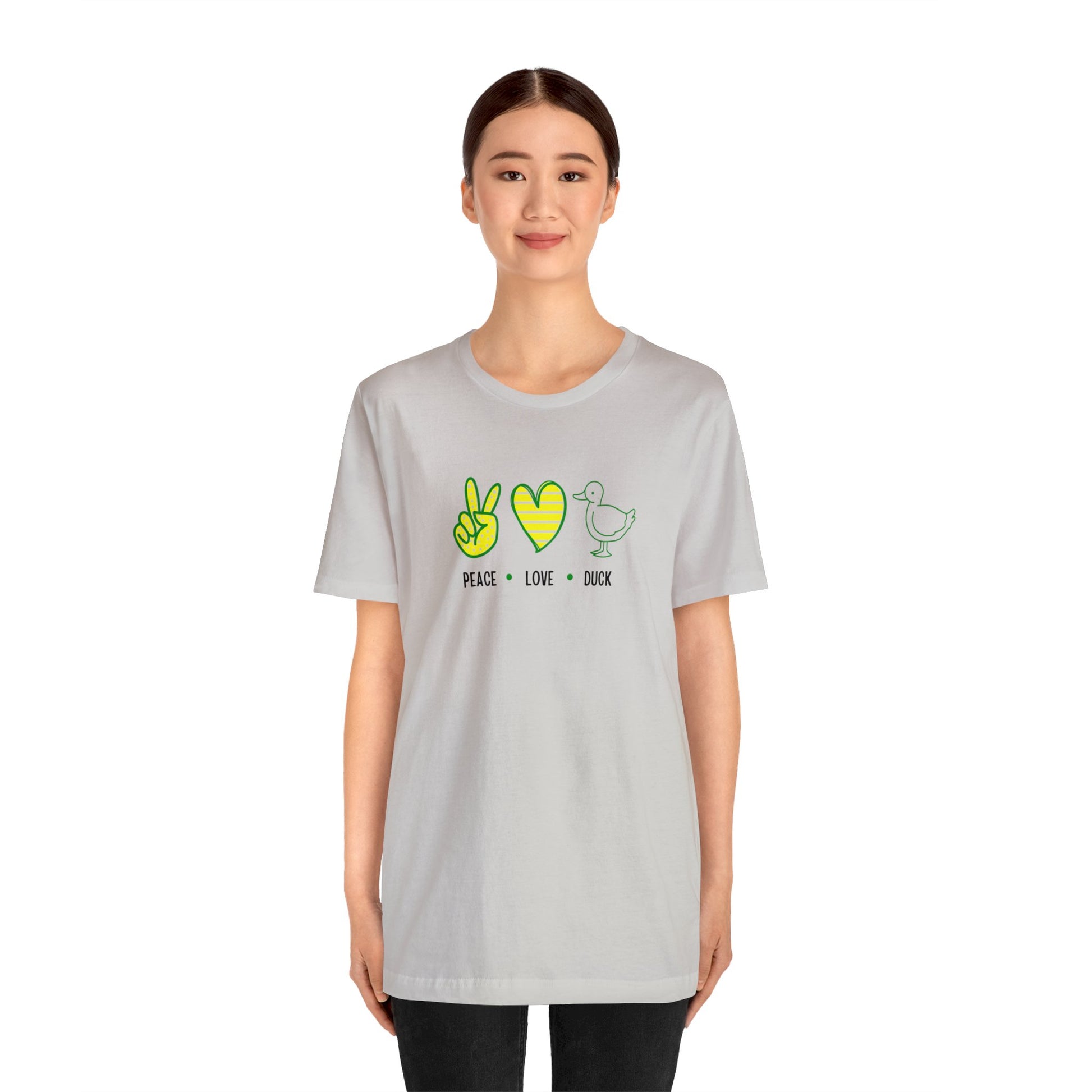 Peace Love Duck T-Shirt paired with trendy accessories for an effortless, chic fan look beyond the stadium.