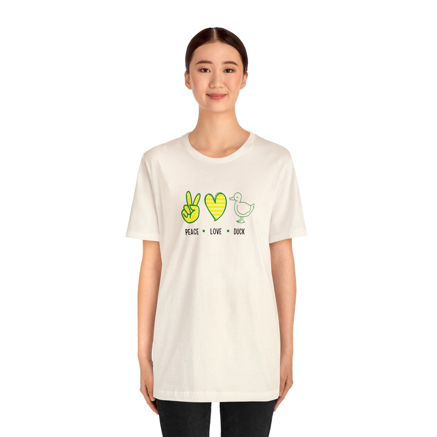 Close-up of Peace Love Duck T-Shirt showing vibrant design with peace, heart, and duck-inspired graphics in bold game-day colors.