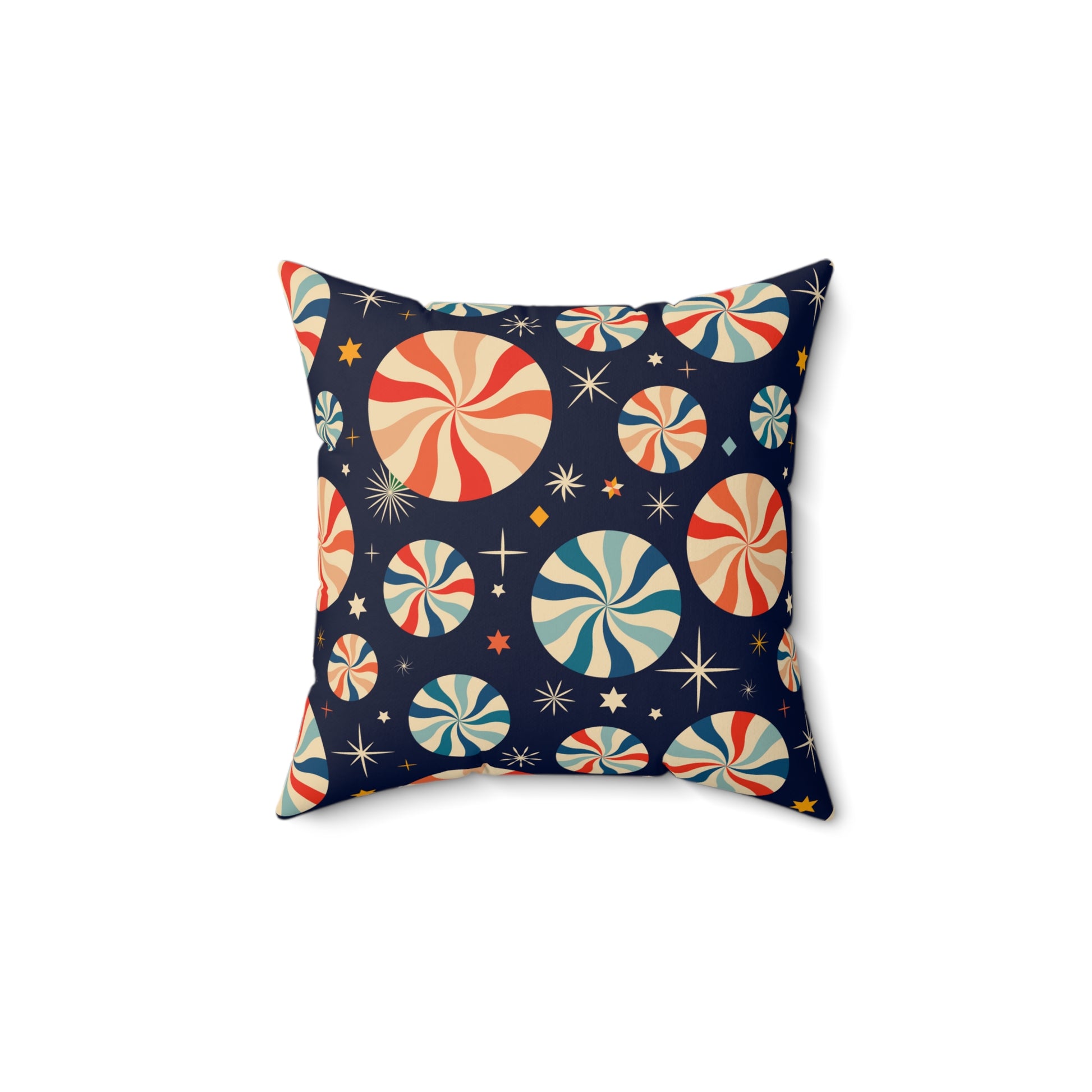 Flat lay of red and white holiday pillow featuring peppermint candy design on soft festive fabric