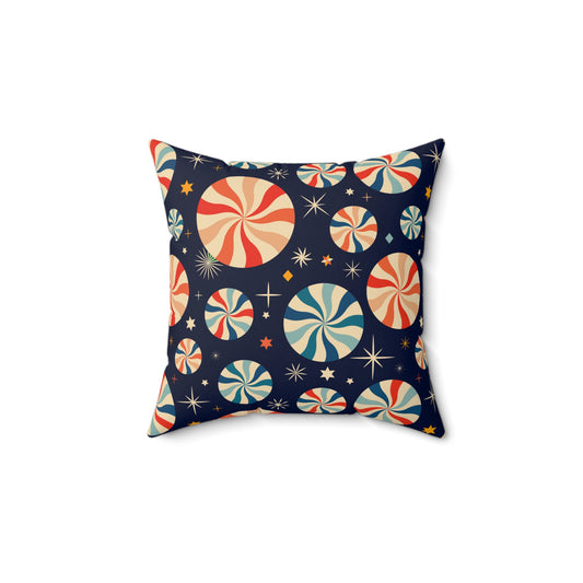 Flat lay of red and white holiday pillow featuring peppermint candy design on soft festive fabric