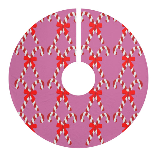 Pink and red bows candy cane Christmas tree skirt under decorated holiday tree