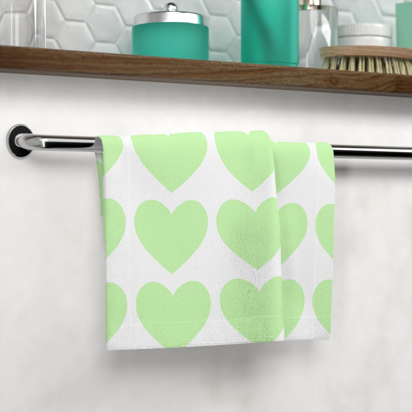 Soft mint and white towel with playful pattern for student bathroom decor