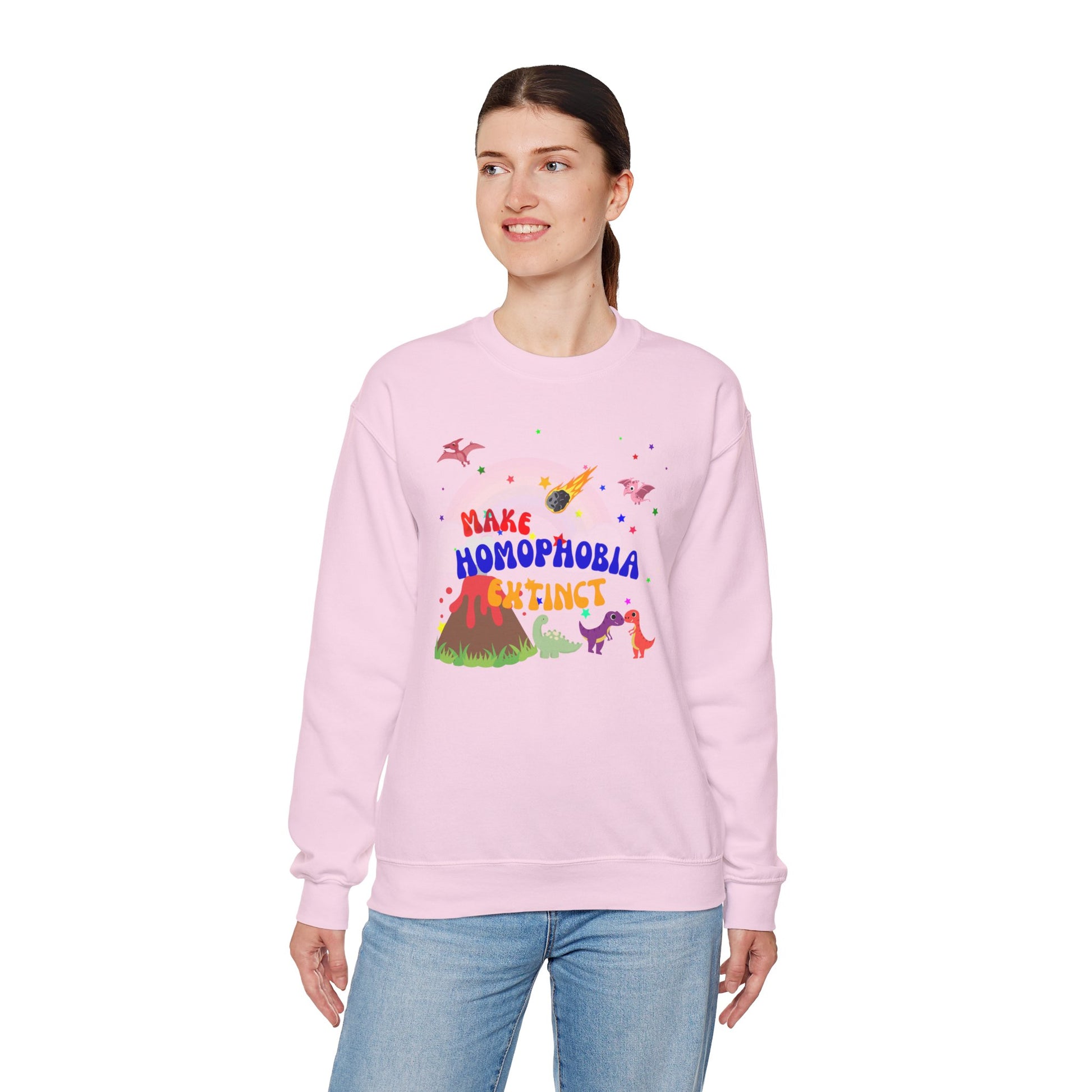 Pastel pink Pride sweatshirt with a charming dinosaur design and “Make Homophobia Extinct” slogan—stylish, expressive, and empowering.
