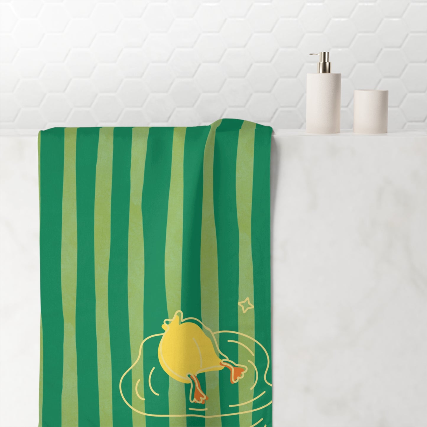 Funny towel with expressive duck plunging across green and yellow striped pattern – retro college-inspired bath accessory