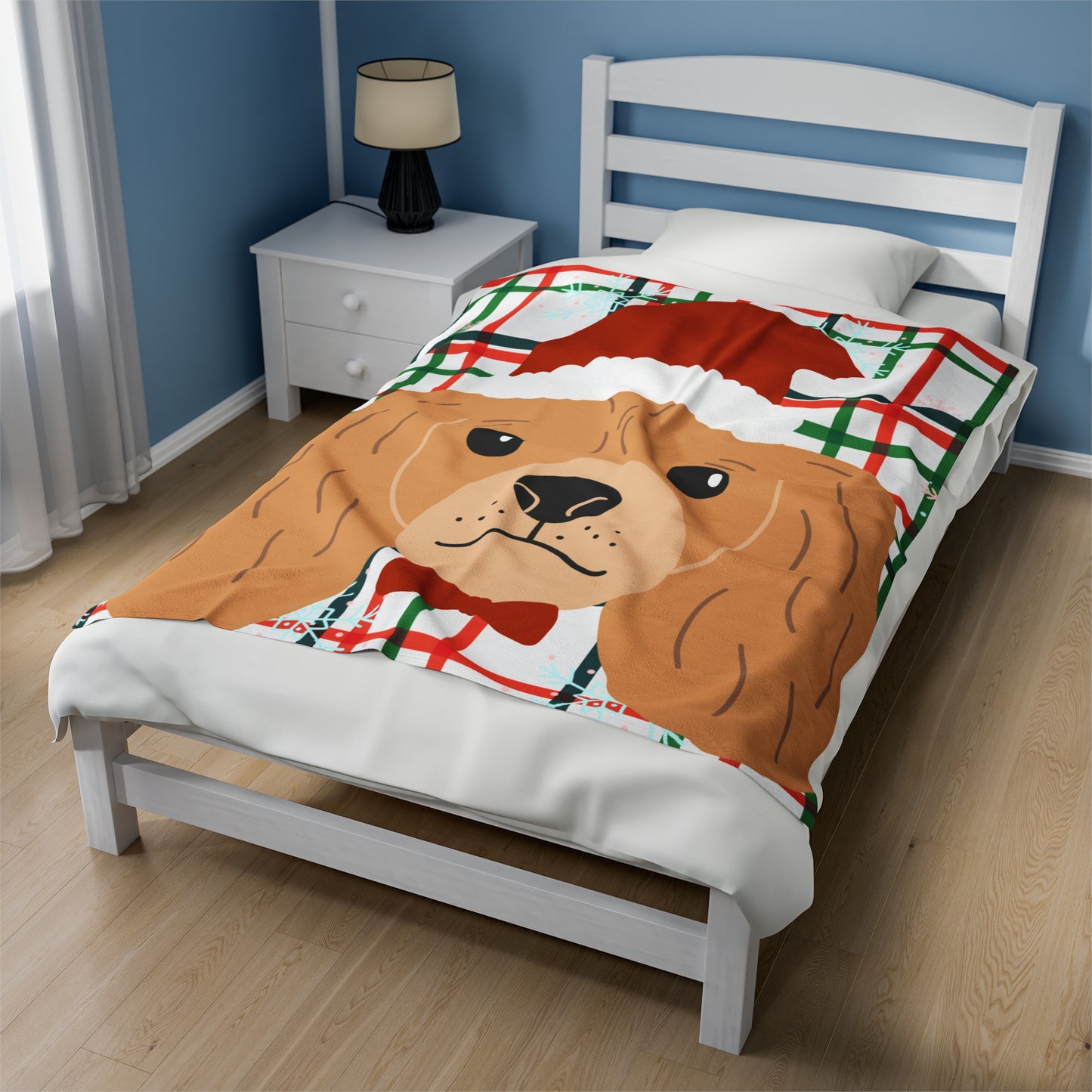 Medium red and green plaid Christmas blanket featuring Cocker Spaniel in Santa hat draped over festive couch with pillows and holiday lights