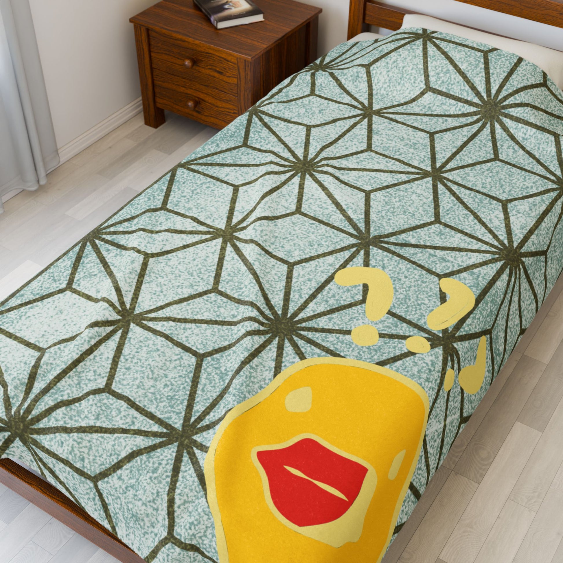 Maximalist throw with gold geometric shapes and quirky duck lettering for dorm or lounge decor