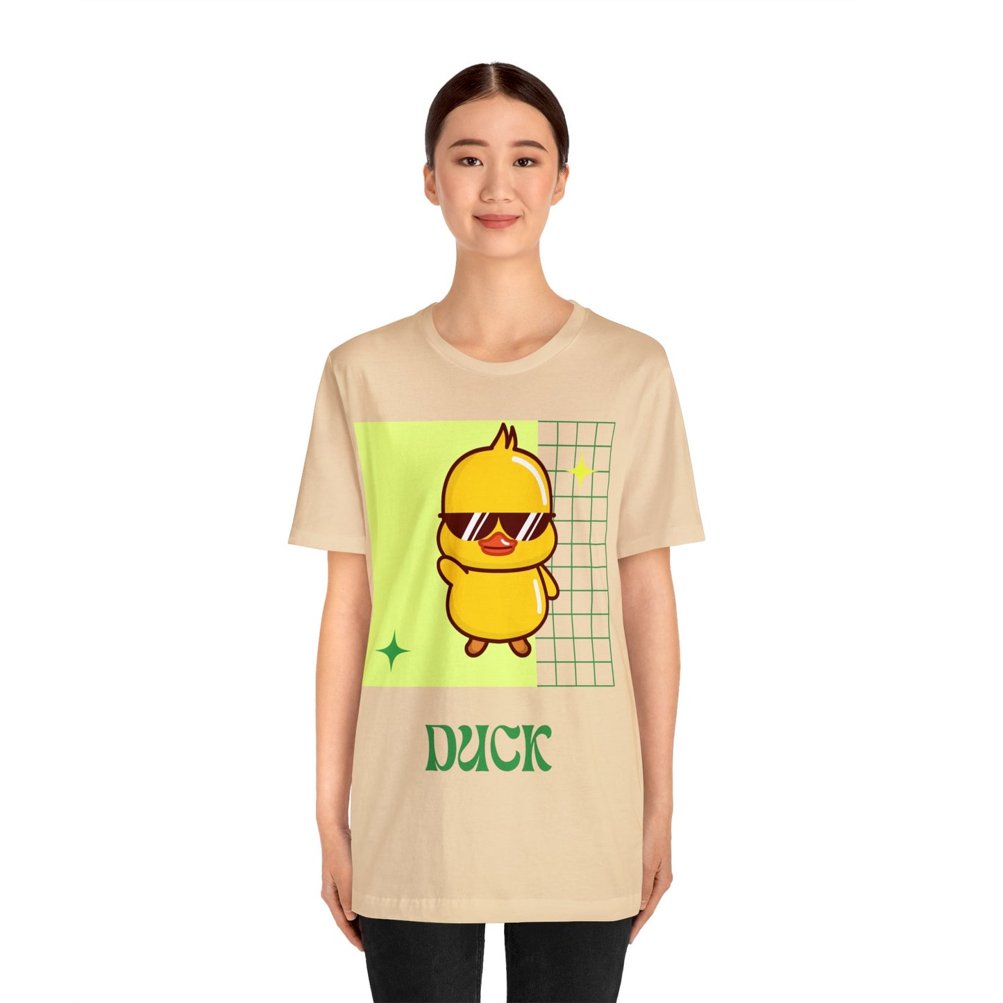 Soft Cream Cute Duck Graphic T-Shirt worn at a tailgate, blending neutral shades with school spirit.