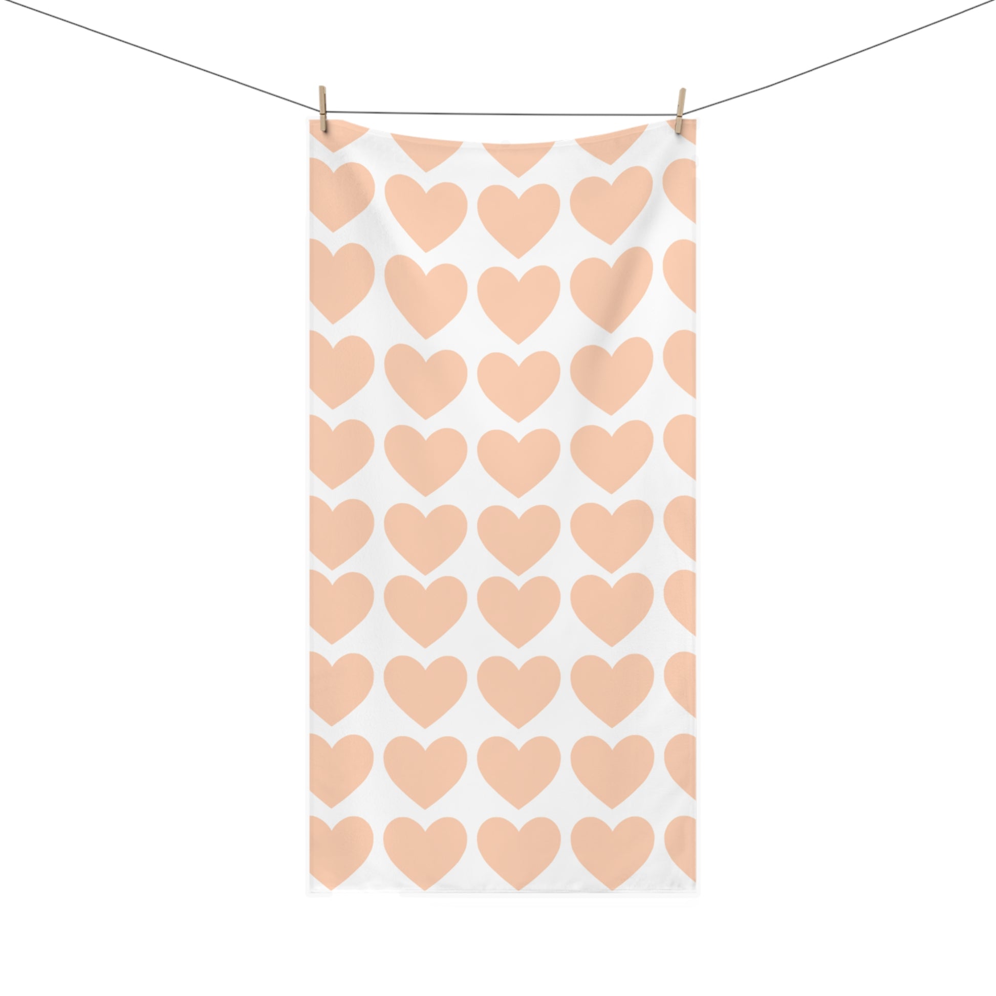 Soft orange hearts bath towel styled in a cozy Corvallis bathroom with college-inspired decor