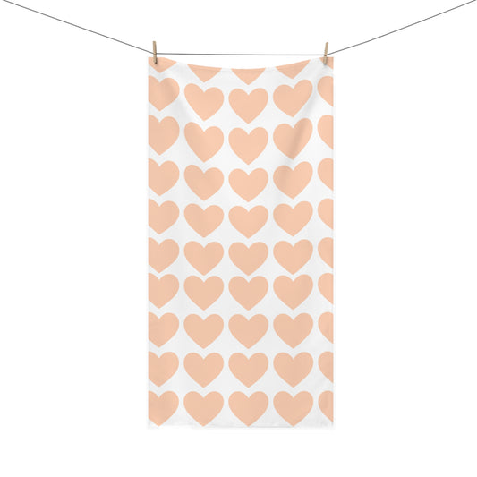 Soft orange hearts bath towel styled in a cozy Corvallis bathroom with college-inspired decor