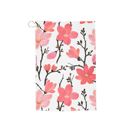 A sunny, nature-inspired golf towel with lush, colorful florals that evoke the warmth and vibrance of a summer garden in full bloom.