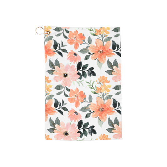 A bright orange floral golf towel featuring vibrant tangerine-toned blooms in a lush garden design. A bold, refreshing take on retro florals.