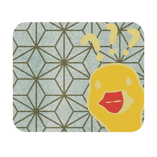 Green and gold geometric mouse pad with “What the Duck” text, styled on a modern college desk with pens, laptop, and headphones