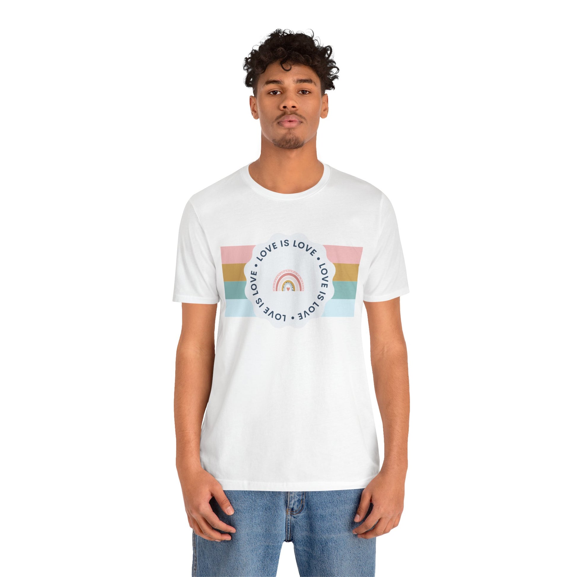 Bright white T-shirt featuring bold “Love Is Love” text in vibrant rainbow colors—expressive, stylish, and perfect for celebrating LGBTQ+ pride.