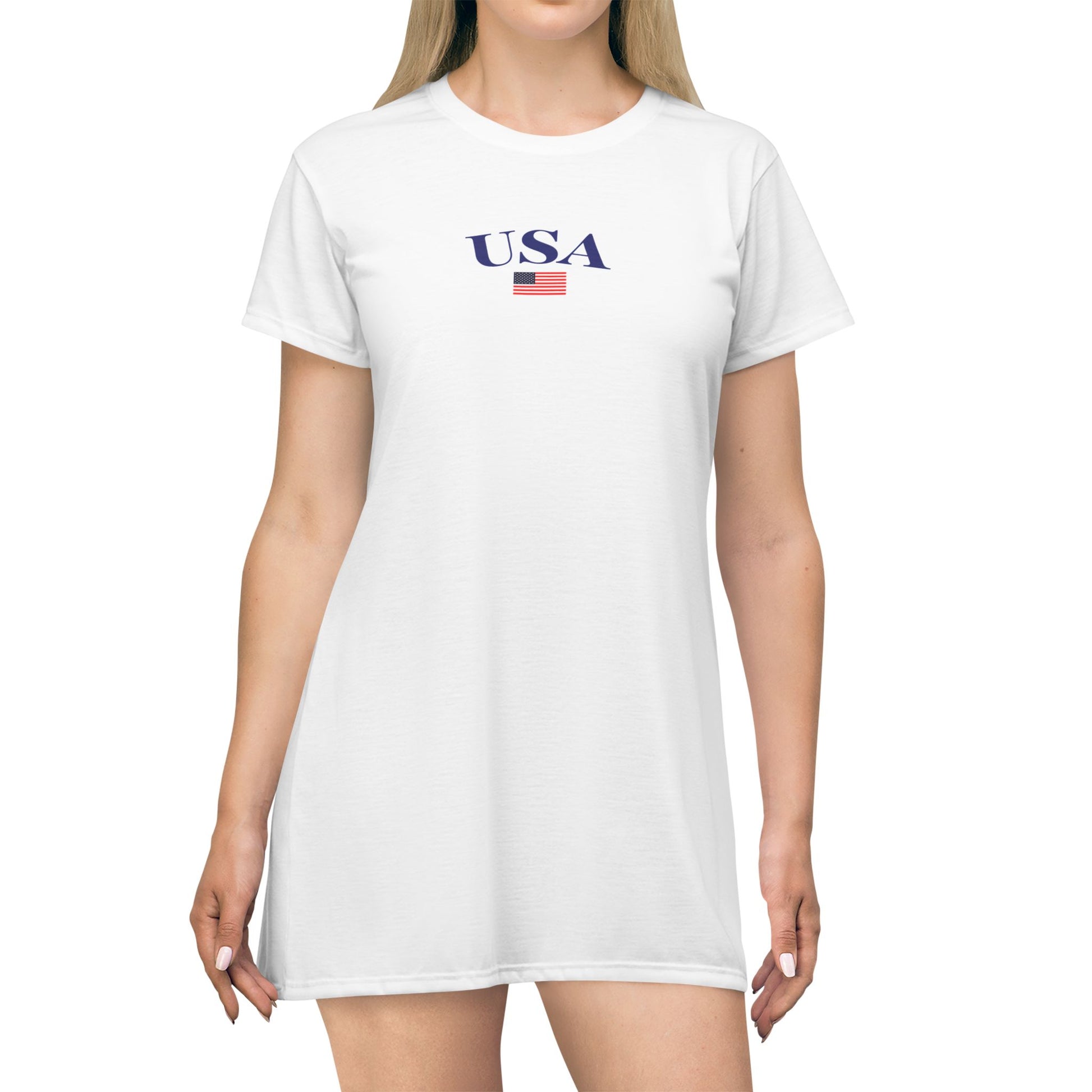 Classic white t-shirt dress featuring a bold USA graphic with an American flag, designed for effortless Fourth of July patriotism and summer comfort.