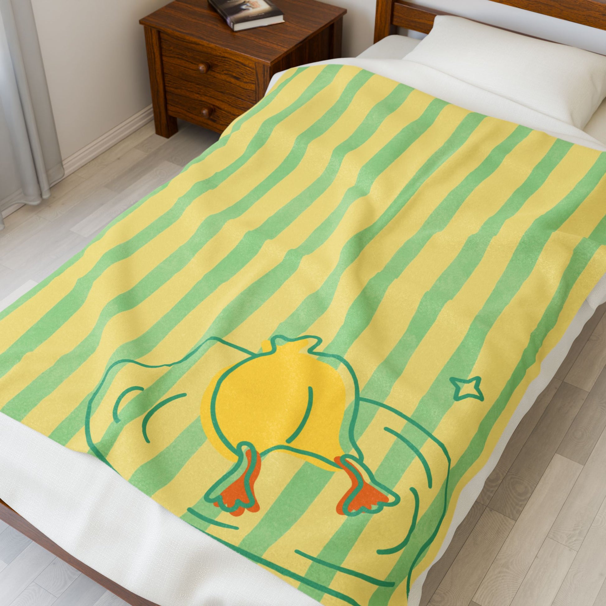 Folded plush blanket featuring duck butt poses and playful stripes for cozy decor