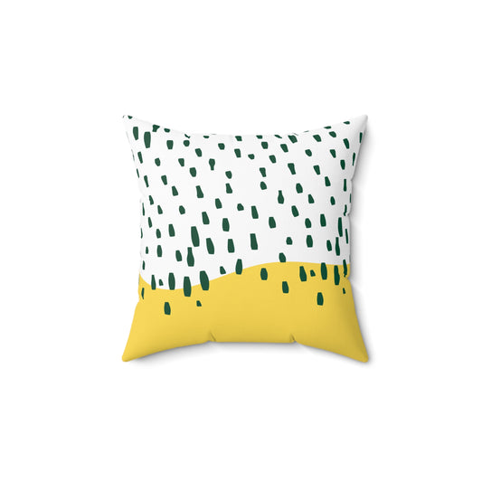 Yellow and green rain-pattern throw pillow styled in a midcentury dorm room